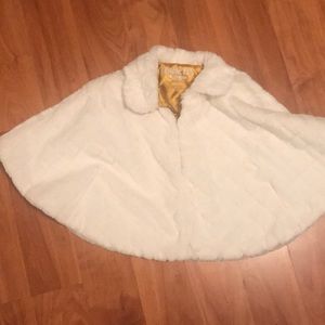 Toddler girls cream colored coat with gold liner